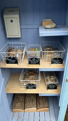 A display of baked goods in a blue and white basket.