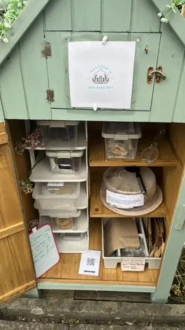 A wooden cabinet with a sign on it.