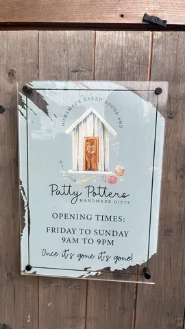 A sign for a store called Patty Potters.