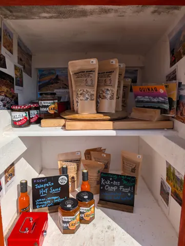 A shelf with various food items on it.