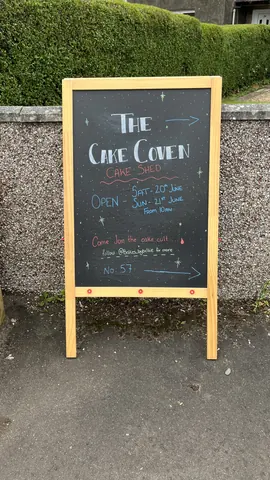 A sign for a cake shop.