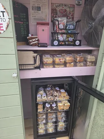 A refrigerator with a sign that says "Pink" on it.