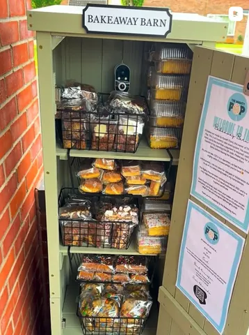 A wooden shelf with a sign that says Welcome to the Jamboree.