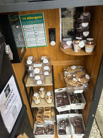 A display case with a sign that says "allergens" on it.