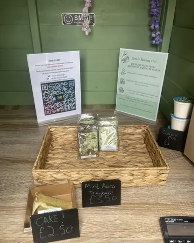 A basket of food is displayed on a table.