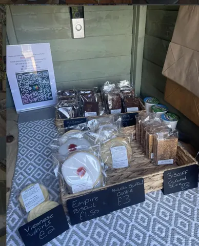 A table with a sign that says "biscuits" on it.