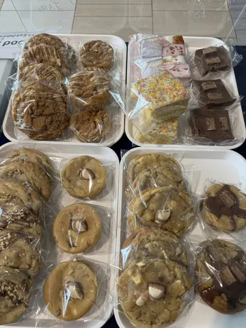 A tray of cookies and cakes.