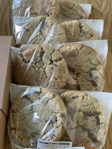 A box of cookies with plastic wrap.