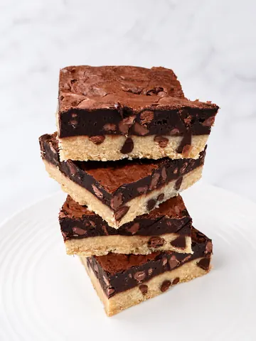 A stack of chocolate and peanut butter bars.