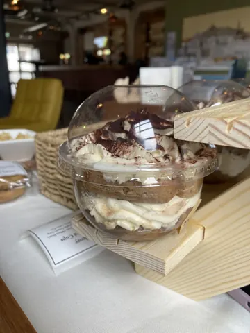 A dessert in a plastic container.