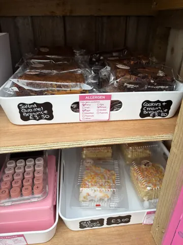 A white box with a pink label on it.