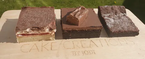 A white sign with the word "creative" on it.