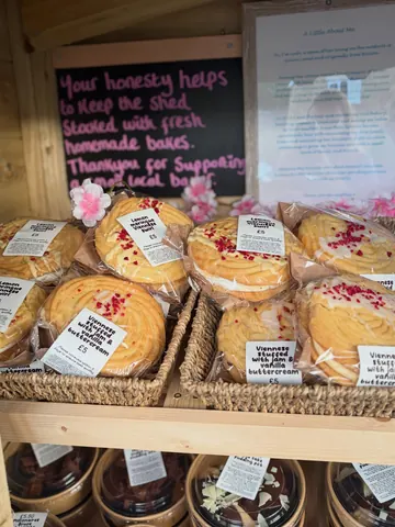 A basket of cookies with red and white frosting.