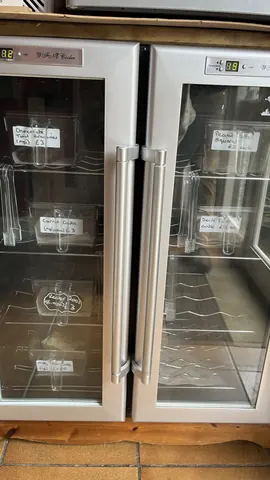 A refrigerator with a sign that says "organic" on it.