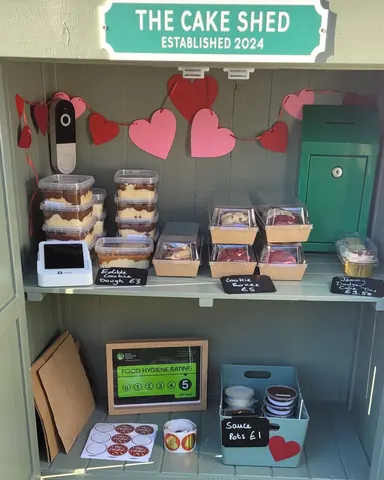 A small green box with a sign that says "Food Hygiene Rating 5" on it.