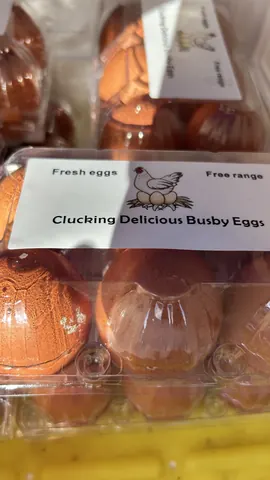 A box of eggs with a chicken on the label.