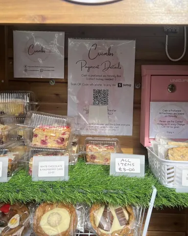 A display of various cakes and pastries.