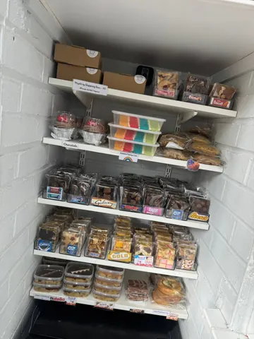 A refrigerator filled with various food items.