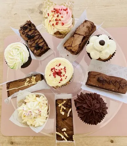 A plate with various desserts on it.