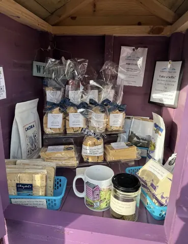 A display of food items in a purple case.