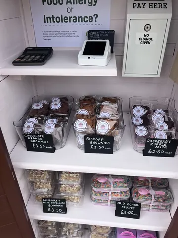 A display of food items with prices on them.