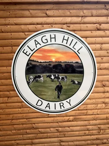 A sign that says "Dairy" on it.
