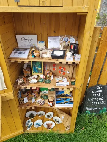 A wooden box filled with various items.
