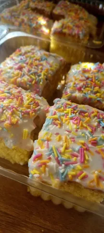 A plate of cake with sprinkles on it.