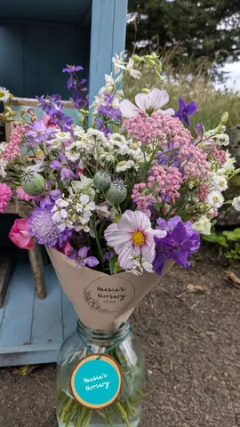 A bouquet of flowers in a vase.