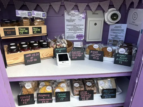 A display of various baked goods is available for purchase.