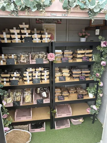 A display of pastries and desserts in a bakery.