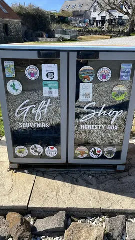 A display case with stickers on it.
