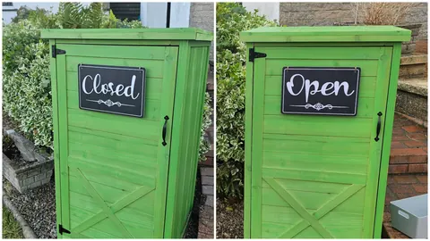Two green doors with a sign that says "closed" on one and "open" on the other.