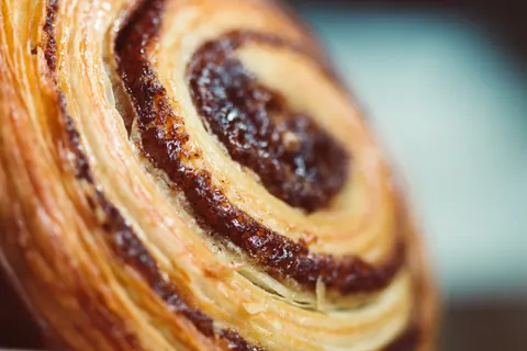 A pastry with a swirl pattern on it.