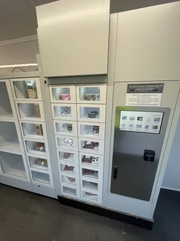 A refrigerator with a sign on the door.