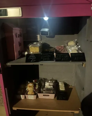 A pink box with a light on inside.