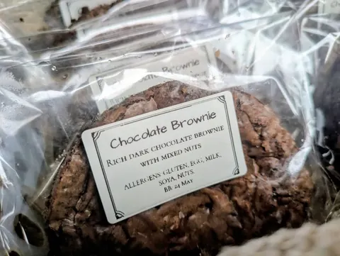 A chocolate brownie with a label on it.