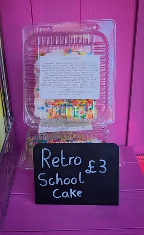 A sign that says Retro School Cake.