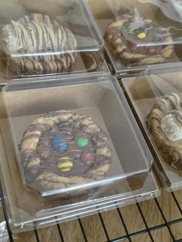 A box of cookies with chocolate and marshmallows.