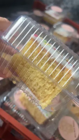 A piece of cake in a plastic container.