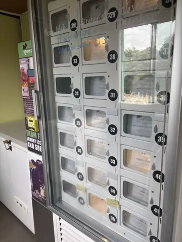 A vending machine with a sign on it that says "no money".