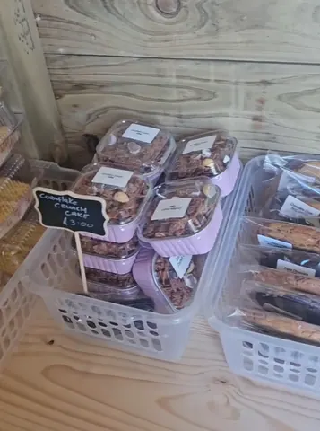A sign that says "Complimentary Crunch" is on a table.