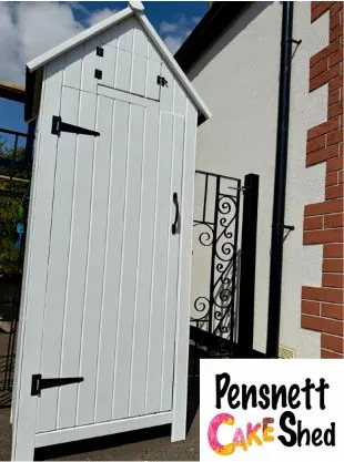 A white door with a black metal railing.