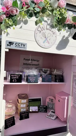 A pink shelf with a sign that says "food allergy intolerance?".
