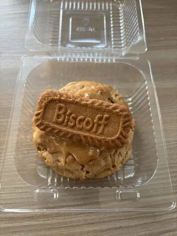 A biscuit with a biscuit logo on it.