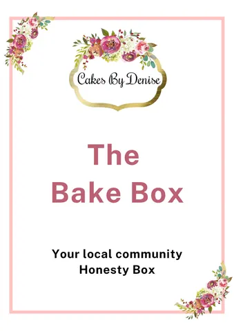 A cake box with a pink background.