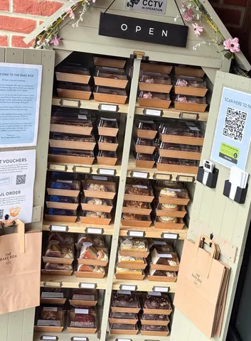 A display case with a variety of food items.