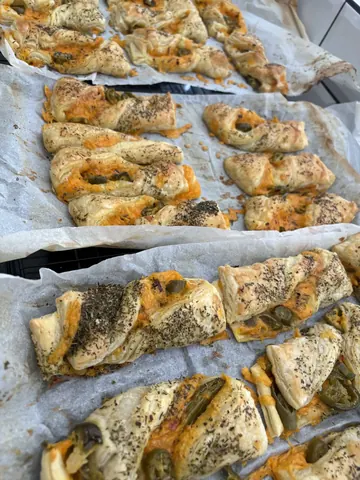 A tray of food with a variety of different foods on it.