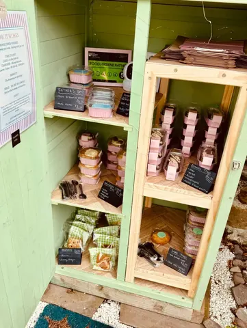 A shelf with a variety of items on it.