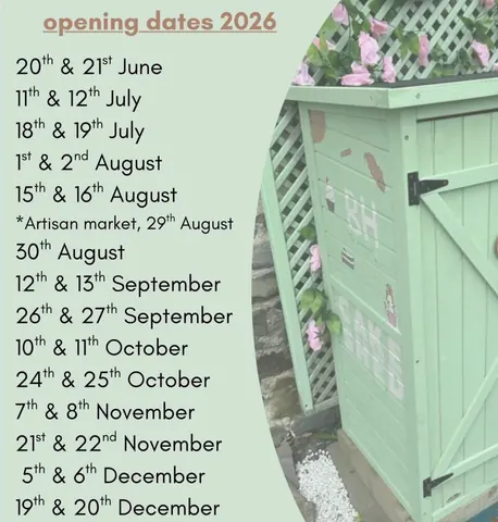 A green shed with a sign that says "Opening Dates 2026".